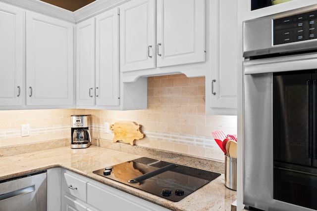 204 Helmsley Ln, Versailles, KY 40383 - kitchen with appliances with stainless steel finishes, white cabinetry, decorative backsplash, and light stone counters