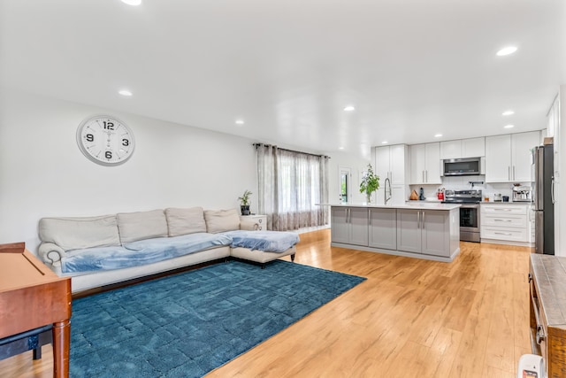 1144 Crenshaw Ln, Nicholasville, KY 40356 - living area with light wood-style floors and recessed lighting