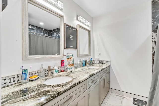 1144 Crenshaw Ln, Nicholasville, KY 40356 - full bathroom with marble finish floor, visible vents, a sink, and double vanity