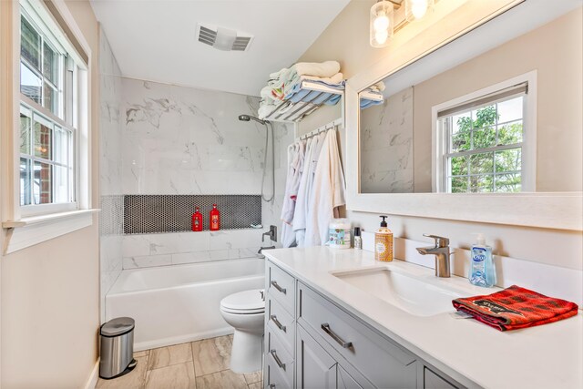 1144 Crenshaw Ln, Nicholasville, KY 40356 - full bath with vanity, toilet, plenty of natural light, and visible vents