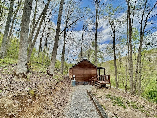 411 Alum Cave Rd, Annville, KY 40402 - view of side of property with log veneer siding