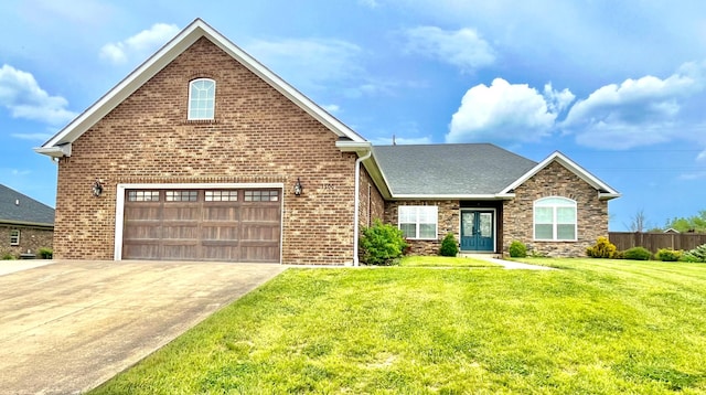 view of front of house with french doors, brick siding, a front lawn, concrete driveway, and stone siding