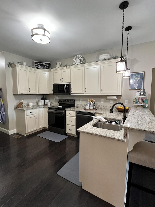 1500 Chardonnay Way, Berea, KY 40403 - kitchen featuring black appliances, a peninsula, dark wood finished floors, and white cabinets