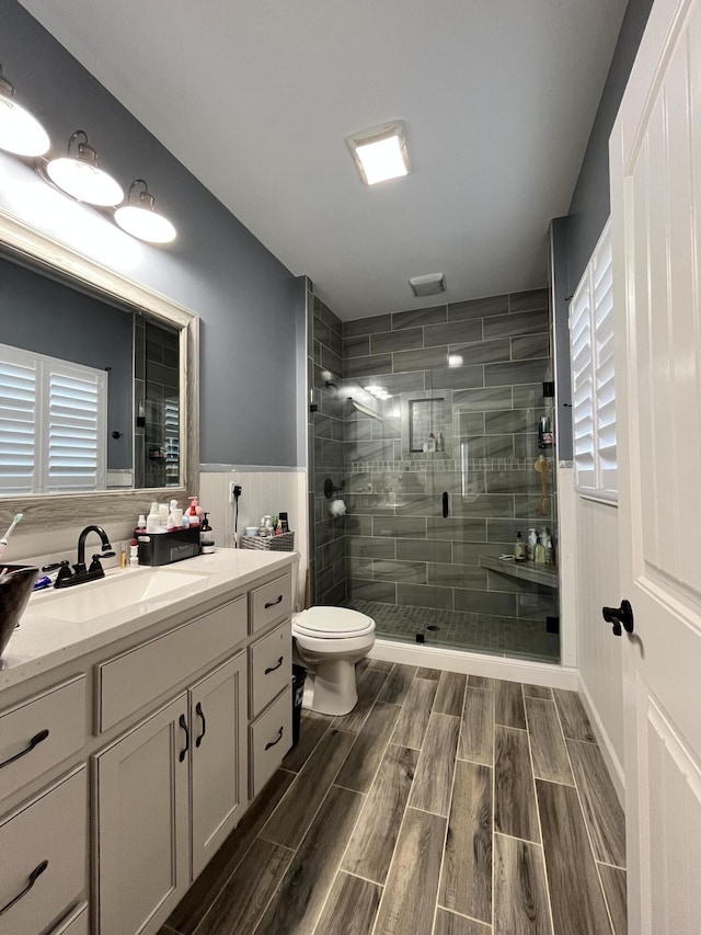 1500 Chardonnay Way, Berea, KY 40403 - full bath featuring vanity, a shower stall, wainscoting, and wood tiled floors