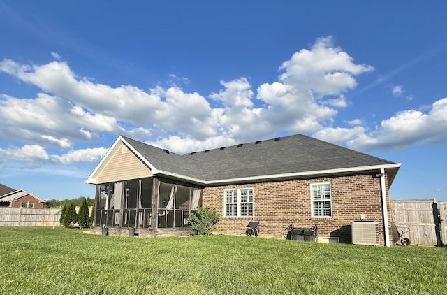 1500 Chardonnay Way, Berea, KY 40403 - rear view of property featuring a sunroom, brick siding, and a shingled roof