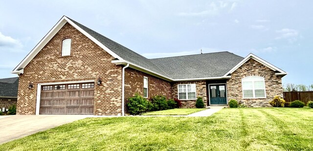 1500 Chardonnay Way, Berea, KY 40403 - view of front of house with driveway, a shingled roof, brick siding, and stone siding