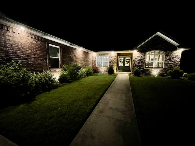 1500 Chardonnay Way, Berea, KY 40403 - ranch-style house with french doors, a lawn, stone siding, and brick siding