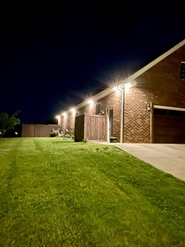 1500 Chardonnay Way, Berea, KY 40403 - yard at night featuring a lawn