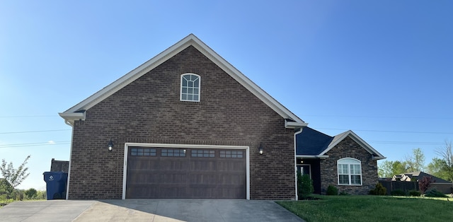 1500 Chardonnay Way, Berea, KY 40403 - view of front of home with a garage, a front lawn, concrete driveway, and brick siding