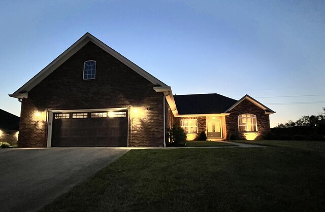 1500 Chardonnay Way, Berea, KY 40403 - traditional-style house with driveway, a garage, brick siding, and a front lawn