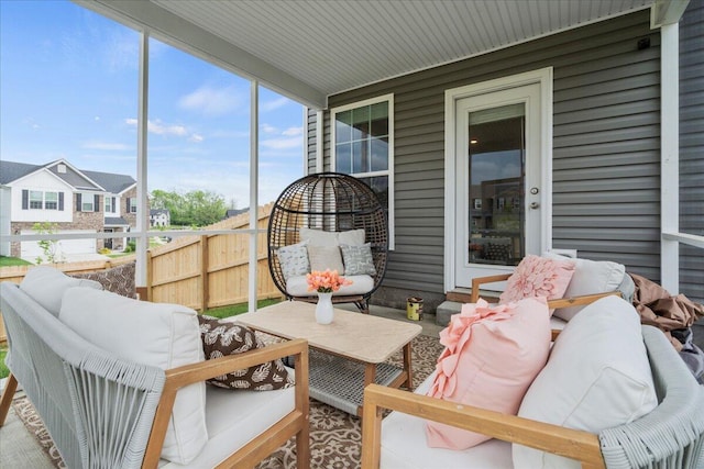 sunroom featuring an outdoor living space