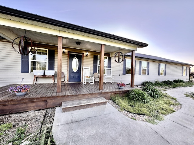 entrance to property with covered porch