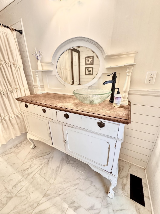 interior details featuring a sink