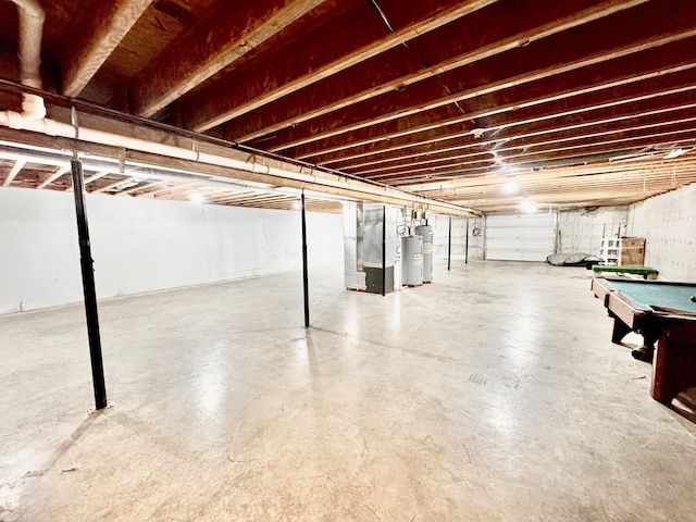 unfinished below grade area with electric water heater