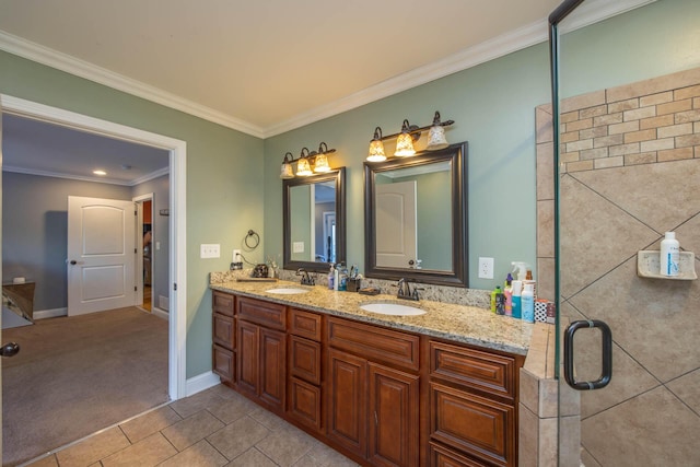 full bathroom featuring crown molding, double vanity, baseboards, and a sink