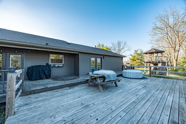 wooden terrace featuring french doors