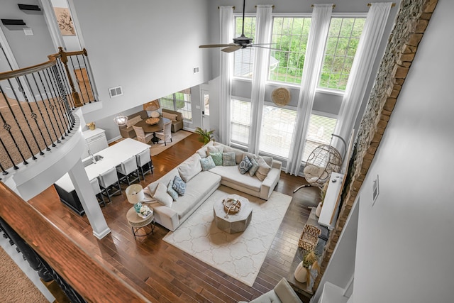 823 Lochmere Pl, Lexington, KY 40509 - living area featuring wood-type flooring, a ceiling fan, stairs, and a towering ceiling