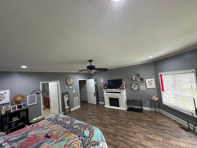 bedroom featuring recessed lighting, baseboards, ornamental molding, and wood finished floors