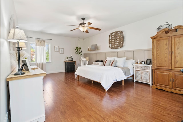 bedroom featuring ceiling fan and wood finished floors