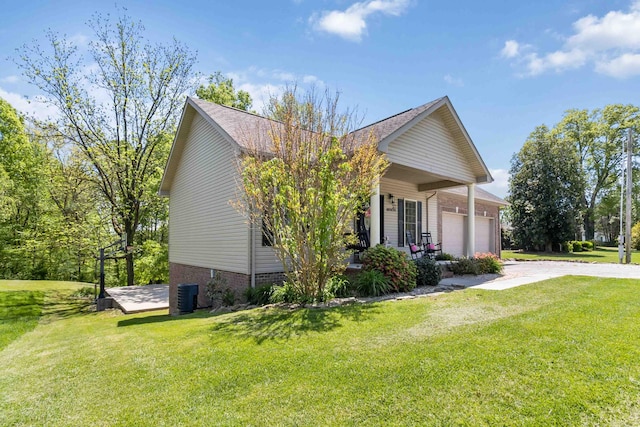 view of property exterior featuring a garage, central AC, driveway, a porch, and a yard