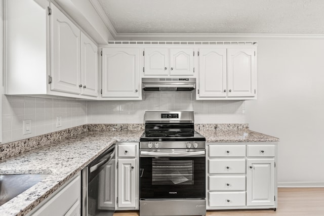 kitchen with crown molding, white cabinetry, under cabinet range hood, tasteful backsplash, and appliances with stainless steel finishes