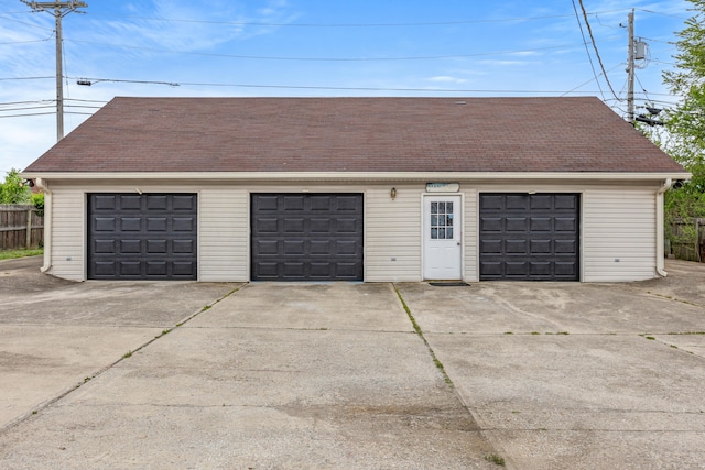 detached garage with fence