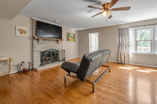 4805 Laurel Creek Cir, Lexington, KY 40515 - living area with ceiling fan, a brick fireplace, baseboards, and wood finished floors