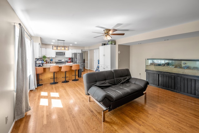4805 Laurel Creek Cir, Lexington, KY 40515 - living area with light wood-type flooring, ceiling fan, and recessed lighting