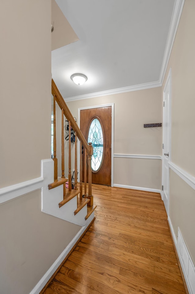 4805 Laurel Creek Cir, Lexington, KY 40515 - foyer entrance featuring crown molding, stairs, and wood finished floors