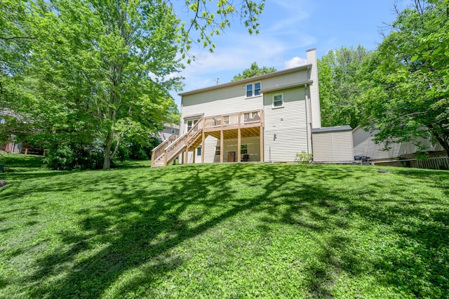 4805 Laurel Creek Cir, Lexington, KY 40515 - back of property featuring stairs, a chimney, a deck, and a yard