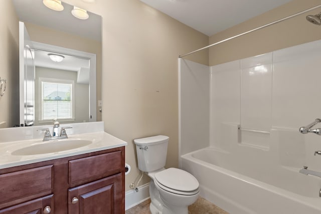 full bath with toilet, shower / bath combination, tile patterned flooring, and vanity