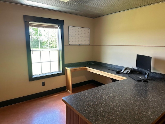 office area featuring baseboards