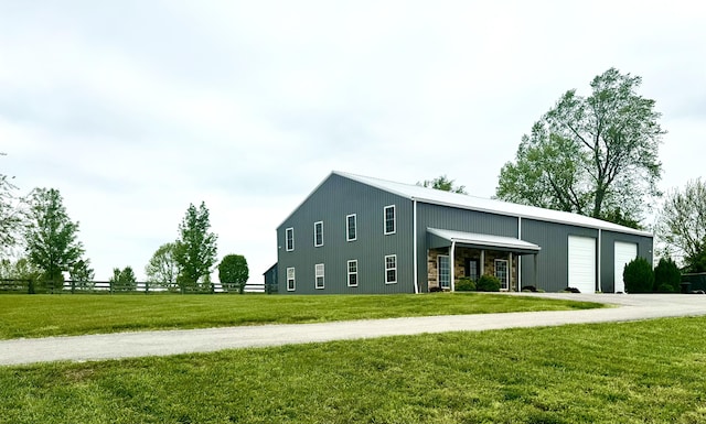 exterior space featuring fence and a lawn
