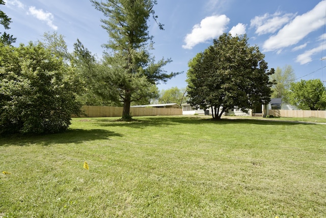 view of yard featuring fence