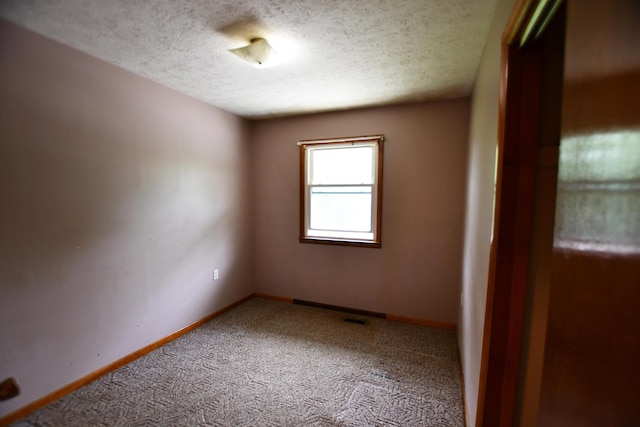 215 Stacy Lane Rd, Irvine, KY 40336 - carpeted empty room with a textured ceiling and baseboards