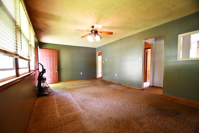 215 Stacy Lane Rd, Irvine, KY 40336 - empty room with carpet, ceiling fan, and baseboards