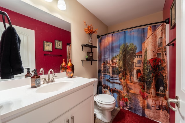 bathroom with vanity, a shower with curtain, and toilet