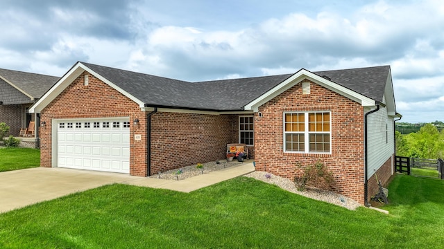 single story home featuring a front yard, brick siding, an attached garage, and roof with shingles