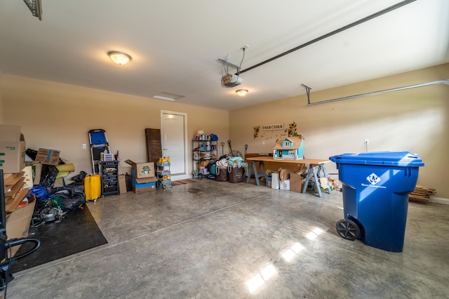 garage featuring a garage door opener