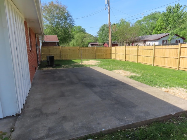 view of patio / terrace featuring central AC unit and a fenced backyard