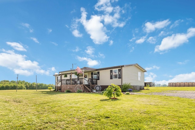 2805 W W Ridge Rd, Eubank, KY 42567 - view of front of home with a porch, stairway, and a front lawn