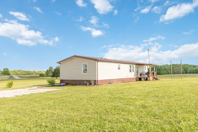2805 W W Ridge Rd, Eubank, KY 42567 - view of side of home with a wooden deck and a yard