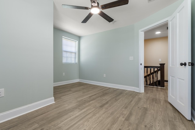 262 Main St, Salt Lick, KY 40371 - unfurnished room featuring light wood-style flooring, ceiling fan, and baseboards