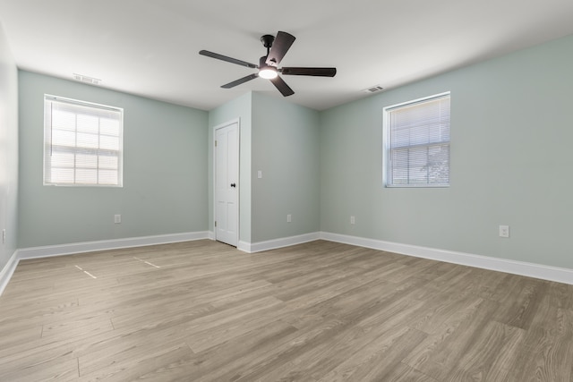 262 Main St, Salt Lick, KY 40371 - empty room featuring light wood finished floors, a ceiling fan, and baseboards