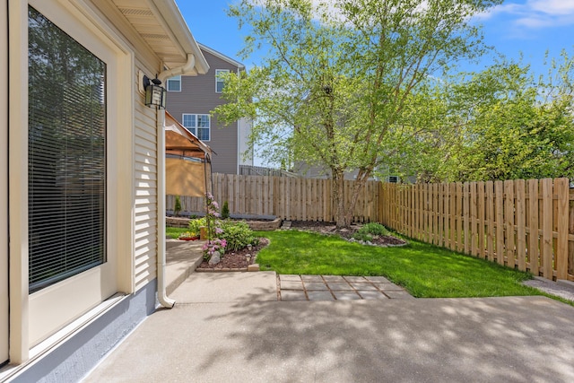 view of patio with a fenced backyard