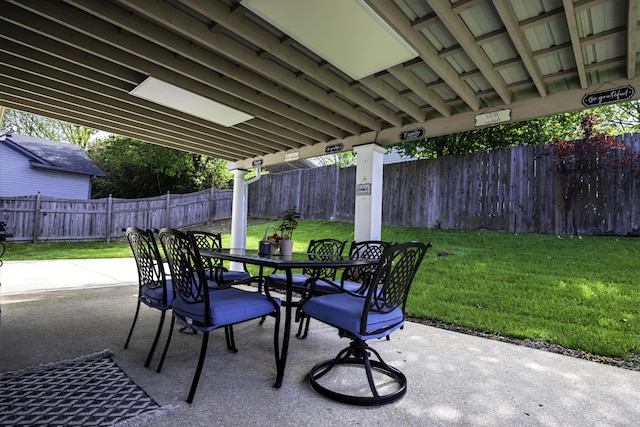 view of patio / terrace with a fenced backyard and outdoor dining space