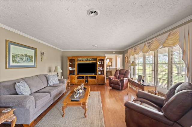223 Lanetown Rd, Nancy, KY 42544 - living room with light wood-style floors, ornamental molding, a textured ceiling, and visible vents
