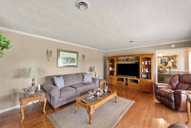 223 Lanetown Rd, Nancy, KY 42544 - living area with crown molding, a textured ceiling, visible vents, and light wood-style flooring