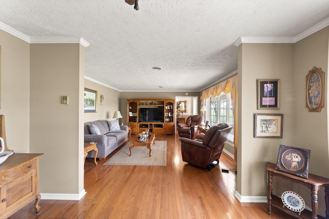 223 Lanetown Rd, Nancy, KY 42544 - living room featuring baseboards, a textured ceiling, crown molding, and wood finished floors