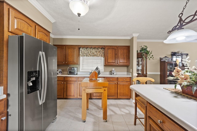 223 Lanetown Rd, Nancy, KY 42544 - kitchen with light countertops, ornamental molding, brown cabinetry, and stainless steel refrigerator with ice dispenser